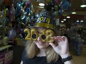 Sarah McGhee, of the Party City store at Southdale and Wharncliffe roads in London, hopes all Londoners have a happy New Year?s Eve celebration Sunday night. (DEREK RUTTAN, The London Free Press)