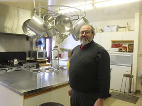 Outreach coordinator John Field stands inside the St. John’s Anglican Church kitchen where food is prepared for community meals, a program for those in need. A dinner and dance is being hosted Jan. 21 by the church to fundraise for the program. (Laura Broadley/Times-Journal)