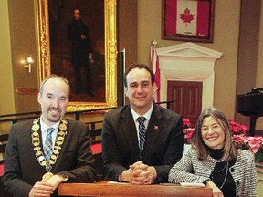 Mayor Bryan Paterson, left, Kingston and the Islands MP Mark Gerretsen and MPP Sophie Kiwala gave remarks at the 2018 New Year’s Levee in Memorial Hall at City Hall on Monday. (Julia McKay/The Whig-Standard/Postmedia Network)