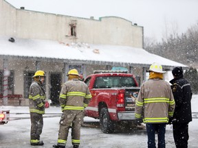 Meghan Balogh/Postmedia Network
Greater Napanee fire crews spent more than an hour Tuesday morning battling a blaze at a Napanee strip mall. The fire has been declared suspicious by OPP and the investigation is continuing.
