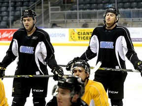 Sean Day, left, and Kingston native Gabe Vilardi at practice with the Kingston Frontenacs at the Rogers K-Rock Centre in Kingston. Both were acquired in a big recent trade with the Windsor Spitfires. (Ian MacAlpine/The Whig-Standard)