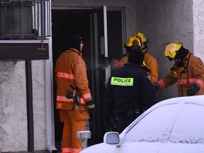 Emergency responders attend the scene during an arrest for a drive-by shooting in Whitecourt on Dec. 31, 2017 (Peter Shokeir | Whitecourt Star).