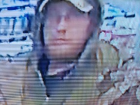 Kingston Police are asking for the public's help in identifying a suspect using a stolen credit card.