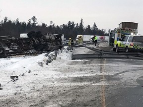 Emergency services respond to transport truck roll-over on Highway 401 on Thursday, Jan. 4, 2018. Photos supplied by Frontenac Paramedic Services