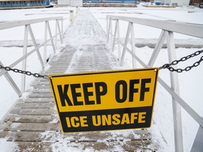 Luke Hendry/The Intelligencer
A sign and chain warn against using the ice at Victoria Park in Belleville Thursday. While the ice was thick enough to support light use, a city supervisor said they're working to improve safety and conditions before opening public rinks there.