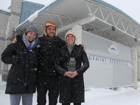 Madeline Line, her brother Geoffrey, and his girlfriend Jill Hughes were among 45 people who spent the night at the Gemini Sportsplex in Strathroy after a blast of winter forced the closure of a long stretch of  Highway 402 Thursday. Middlesex OPP said they expected it to reopen by Friday evening. Hughes is also holding her pet beta fish Pat. (Tyler Kula/The Observer)