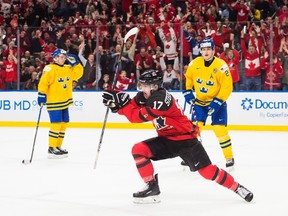 Canada forward Tyler Steenbergen (17) celebrates his game winning goal against Sweden during third period gold medal final IIHF World Junior Championships hockey action in Buffalo, N.Y., on Friday, January 5, 2018. 
THE CANADIAN PRESS/Nathan Denette