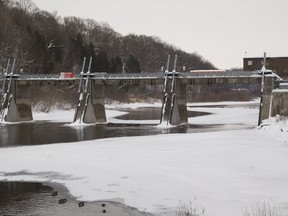 The broken Springbank Dam in London. (MIKE HENSEN, The London Free Press)