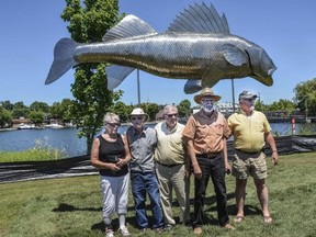 File Photo
Bill Lishman (second from right) is the artist behind Pisces Pete. Lishman passed away Dec. 30, 2017. Also pictured are Armella Moring, Murray Townsend, Doug Sims and Trent Hills Mayor Robert Crate.