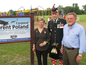 From left, Pat Poland, Lt.-Col. Mark Poland and Don Poland, the parents and brother of the late Corporal Brent Poland, are shown in this file photo standing next to a playground at Errol Village Public School dedicated Friday June 23, 2017 in the memory of Brent Poland, a former student who died in 2007 while serving in Afghanistan. The Errol Village School Council was named to Plympton-Wyoming Mayor Lonny Napper's Community Appreciation Awards list for its efforts to raise money for the project. (File photo)