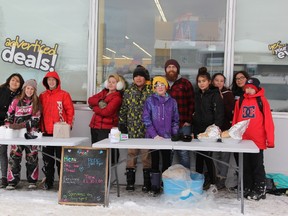Grade seven students from Cochrane Public School along with their teacher Shea Henderson provided local residents with hot soup and homemade bread late last month.