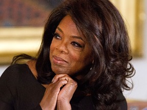 In this Nov. 20, 2013, file photo, Oprah Winfrey listens in the East Room of the White House in Washington, during a ceremony where President Barack Obama awarded Presidential Medals of Freedom. (AP Photo/Jacquelyn Martin, File)