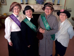 Suffragette reenactors Maureen Ryan (left), LauraJean McCann, Nancy Johnson, and Joanne Lubansky Johns in costume at Eldon House on Ridout Street. A number of events are being planned across London to celebrate the upcoming 100th anniversary of Canadian women receiving the right to vote. (CHRIS MONTANINI, Londoner)