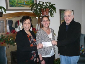 Inner City Home of Sudbury representatives Mary Ali, left, executive director, Darla Barnes and Terry Jackson show off the cheque. Supplied photo