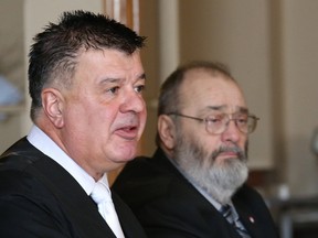 Ward 2 Coun. Michael Vagnini, left, makes a point as Ward 3 Coun. Gerry Montpellier looks on at a press conference at the Italian Club in Copper Cliff, Ont. on Tuesday December 19, 2017. Vagnini and Montpellier held the media conference to discuss an investigation launched against them regarding the fire optimization plan. John Lappa/Sudbury Star/Postmedia Network