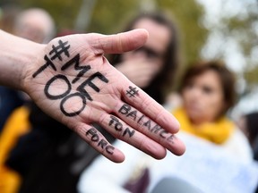 A picture shows the message Me too on the hand of a protester during a gathering against gender-based and sexual violence in Paris Oct. 29, 2017.
GUAYBERTRAND GUAY/Getty Images