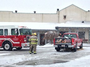 Greater Napanee Fire Services respond to a call on Palace Road in Napanee on Tuesday, January 2, 2018. A commercial building that houses a number of businesses was on fire. It took fire crews one and a half hours to put out the flames, which affected one unit at the back of the building that houses the Palace Market. OPP are investigating the fire as suspicious, and fire crews were looking at causes into the afternoon. Meghan Balogh/Napanee Guide/Postmedia Network