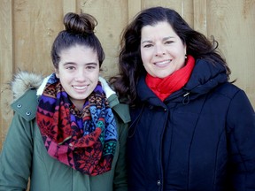 Tillsonburg's Zoey Papadakos, 14, on the left, is congratulated by Shelley Green, Executive Director of the Alzheimer Society of Oxford, on becoming the youngest member of the Walk for Alzheimer's Wall of Fame, for those who have raised more than $5,000 or more. This year's Walk for Alzheimer's in Tillsonburg is Jan. 20, 9-11 a.m. at the Tillsonburg Community Centre. There's still time to get a pledge sheet at Shopper's Drug Mart and join the fun. (Chris Abbott/Tillsonburg News)