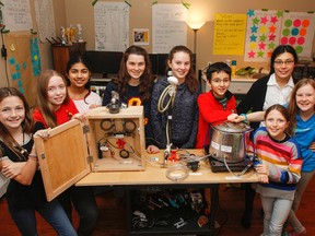 A local FIRST Lego team, the Comet Warriors, are seen with their hydrodynamics project, a “smart water recirculation system” that helps save water while showering. Member of the team seen with the project are, from left, Macy Preston, Hannah Moore, Neshaya Wijeratne, Lily Goss, Olivia O’Driscoll, Nicholas Benavides, team mentor Ella Hsu, Alyssa Whalen and Tara O’Driscoll (Lais Soares not shown). (Julia McKay/The Whig-Standard/Postmedia Network)