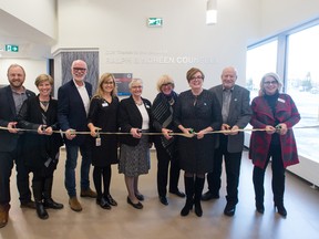 With a snip of the ribbon Tuesday in St. Thomas, St. Thomas-Elgin General Hospital opened its Great Expansion, supported by a successful $16 million fundraising campaign. From left: Paul Jenkins, STEGH Foundation executive director;  EML MP Karen Vecchio; former STEGH president Paul Collins; STEGH President and CEO Dr. Nancy Whitmore; STEGH board chair Cathy Crane; Donna Ladouceur, acting co-CEO, South-West LHIN; Eleanor McMahon, Ontario tourism, culture and sport minister representing the Ontario government; fundraising campaign chair Ken Monteith; STEGH Foundation chair Sandra DiMeo. (Mark Girdauskas/Photos by MG)