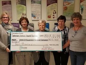 Mary Lou Crowley, left, executive director of the Foundation of CKHA, and Gaye Thompson, board chair, accept a $10,000 donation from Pat Brett, Millie Bechard and Mari Cole, of the Sydenham District Hospital Auxiliary. (Handout)