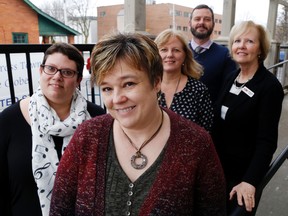 Luke Hendry/The Intelligencer
Hospice Quinte staff Louise Wood, left, Jennifer May-Anderson, Cathy Poulter, Michael Kelly and Jan MacInnes stand outside their office Thursday in Belleville. They expect to begin a capital campaign for their first residential hospice within a few months.