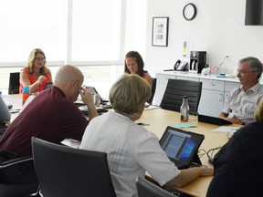 Members of the Elgin-St. Thomas board of health discuss a proposed merger with Oxford County Public Health. The completion date for the merger is May 1 but hinges on a regulation amendment by the Ministry of Health and Long-Term Care, one the ministry has not yet made. (Louis Pin/Times-Journal)