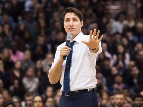 Prime Minister Justin Trudeau answers questions from the public during his town hall meeting in Hamilton, Ont., on Wednesday, January 10, 2018. (THE CANADIAN PRESS/Nathan Denette)