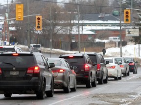 Southbound traffic on Montreal Street at the corner of Railway Street is backed up during a Thursday power outage. (Ian MacAlpine/The Whig-Standard/Postmedia Network)