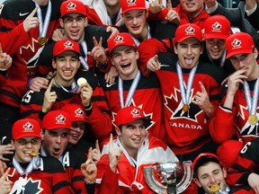 Canada celebrates a 3-1 victory over Sweden in the title game of the world junior hockey championships, Friday, Jan. 5, 2018, in Buffalo, N.Y. (AP Photo/Jeffrey T. Barnes)