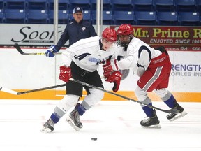 Christian Gaudreau battles Liam Ross during a drill at Sudbury Wolves training camp in Sudbury, Ont. on Thursday August 31, 2017. Gaudreau joined the Rayside-Balfour Canadians in a trade this week. Gino Donato/Sudbury Star/Postmedia Network