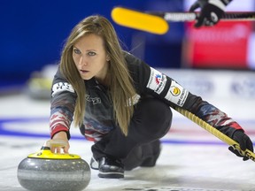 Rachel Homan delivers a rock in the fourth end against Swiss skip Silvana Tirinzoni during the first draw at the World Financial Group Continental Cup at Western Fair Sports Centre on Thursday. The Canadian rink struggled, falling behind 5-0 after two ends, and lost 9-3. (MIKE HENSEN, The London Free Press)