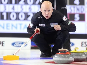 Canadian skip Kevin Koe watches a rock approach during their Friday morning draw against Benoit Schwarz of Switzerland at the World Financial Group Continental Cup at the Western Fair Sports Center in London, Ont. Koe won 8-4. (MIKE HENSEN, The London Free Press)