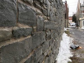 The city's heritage researchers are to look into the value of a section of stone wall in the downtown for possible heritage protections in Kingston, Ont. on Friday, Jan. 12, 2018. 
Elliot Ferguson/The Whig-Standard/Postmedia Network