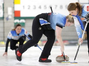 Vice Crystal Webster shouts instructions to team mates Amanda Gates and Jennifer Wylie of the Idylwylde team Fleury as they sweep during the Northern Ontario Curling Association Women's Scotties provincial play down action against team Croisier also of the Idylwylde at the Idylwylde Golf & Country Club in Sudbury, Ont. on Thursday January 11, 2018. The play downs run until Saturday with the finals taking place at 7:30.Gino Donato/Sudbury Star/Postmedia Network