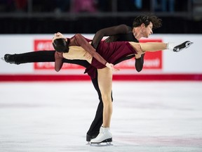 Tessa Virtue, front, and Scott Moir perform their free dance during the senior ice dance competition at the Canadian Figure Skating Championships in Vancouver, B.C., on Saturday January 13, 2018. (THE CANADIAN PRESS/Jonathan Hayward)