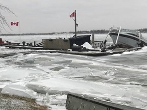 Ice has caused extensive damage to the docks on the Canadian side of the St. Clair River in Port Lambton, Sombra and Courtright. Shown is ice not only damaging a dock near Sombra, but also a boat lifted several feet out of the water. (Handout)