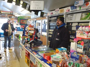 Chad Ghattar, right, owns the variety store at the corner of St. George Street and Wellington Road, in the town of Lynhurst north of St. Thomas. He and other residents have been frustrated about road and storm sewer conditions, but the municipality is finally expected to address those issues -- through a four-year, $10.5 million project. (Louis Pin // Times-Journal)