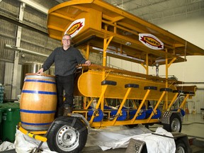 Brad Oke of Smackwater Jack?s in Grand Bend is launching a 16-person (10 pedallers) tour bike that will travel between craft breweries in east London starting in April. It?s being launched Tuesday with the board members of Tourism London taking a spin at Anderson Craft Ales. (Mike Hensen/The London Free Press)