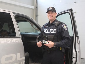 Const. Travis Sandham of the traffic and crime prevention unit with the St. Thomas police shows off a breathalyzer used to identify impaired drivers. Sandham predicts the number of impaired drivers will increase as marijuana becomes legal. (Laura Broadley/Times-Journal)