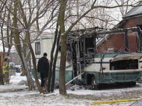 The cause of a fire that damaged a motor home and a house it was parked next to at the corner of Indian Road and Exmouth Street Tuesday morning was under investigation. Fire officials said there were no injuries. (Paul Morden/Sarnia Observer)