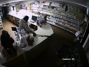 Lambton OPP released a surveillance photo from an alleged break-in early Saturday morning at a pharmacy in Alvinston. (Handout)
