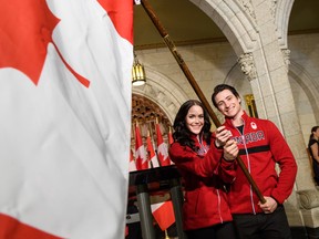 Tessa Virtue and Scott Moir will carry Canada's flag into the opening ceremony at next month's Winter Games in PyeongChang (Vincent Ethier/COC)
