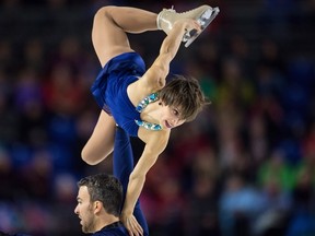 Meagan Duhamel, top, and Eric Radford perform their free program during the senior pairs competition at the Canadian Figure Skating Championships in Vancouver, B.C., on Saturday January 13, 2018. Jonathan Hayward/The Canadian Press