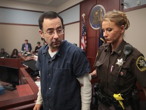 Larry Nassar appears in court to listen to victim impact statements prior to being sentenced after being accused of molesting about 100 girls while he was a physician for USA Gymnastics and Michigan State University, where he had his sports-medicine practice on January 16, 2018 in Lansing, Michigan. (Photo by Scott Olson/Getty Images)