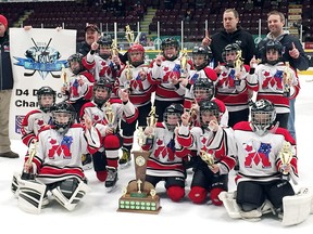The Mooretown Atom AE Jr. Flags won the D4 championship at the 60th annual Peterborough Liftlock Atom Hockey Tournament on Sunday, Jan. 14, 2018. The Jr. Flags are, front row, left: Jaden Hayward, Paxton Burnie, Hunter Oblak, Cohen Harrison, Nolan Stewart, Jace Burgess and Nathan Sylvester. Middle row: Benjamin Grant, Blake Robinson, Maximus Maoirat, Austin Dalgety, Hudson Rodrigues, Dougal Routley and Adam Lane. Back row: Joe Rodrigues, head coach Spencer Dalgety, Scott Robinson and Jeff Grant. Absent are Zachary Riley and manager Marilyn Maoirat. (Contributed Photo)
