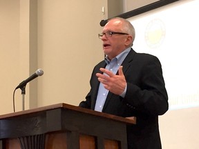 Barry Senft, CEO of Grain Farmers of Ontario, talks to members at a district meeting near Springfield Wednesday. The organization has been marketing to people outside their usual circles to change public opinions on grain products and GMOs -- people like young mothers and millennials. (LOUIS PIN, Times-Journal)