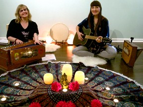 Musicians Karyn Austin (left) and Rachel McGarry are two-thirds of the local kirtan band Mahadevi. Along with bandmate Marlee Bond, the trio has developed a niche performing traditional and modern kirtan music, best suited for spiritual experiences such as meditation or yoga. (CHRIS MONTANINI\LONDONER\POSTMEDIA NETWORK)