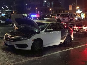 A car burst into flames at Dundas and Wellington streets on Wednesday afternoon. (MEGAN STACEY, The London Free Press)