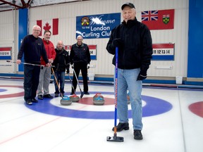 London Curling Club member Ken Walmsley also leads a committee responsible for organizing the club’s annual fundraiser for prostate cancer research. Also pictured are fellow members Steve Bowden (left), Ron Reilh, John Brown, and Doug Petch. (CHRIS MONTANINI, Londoner)